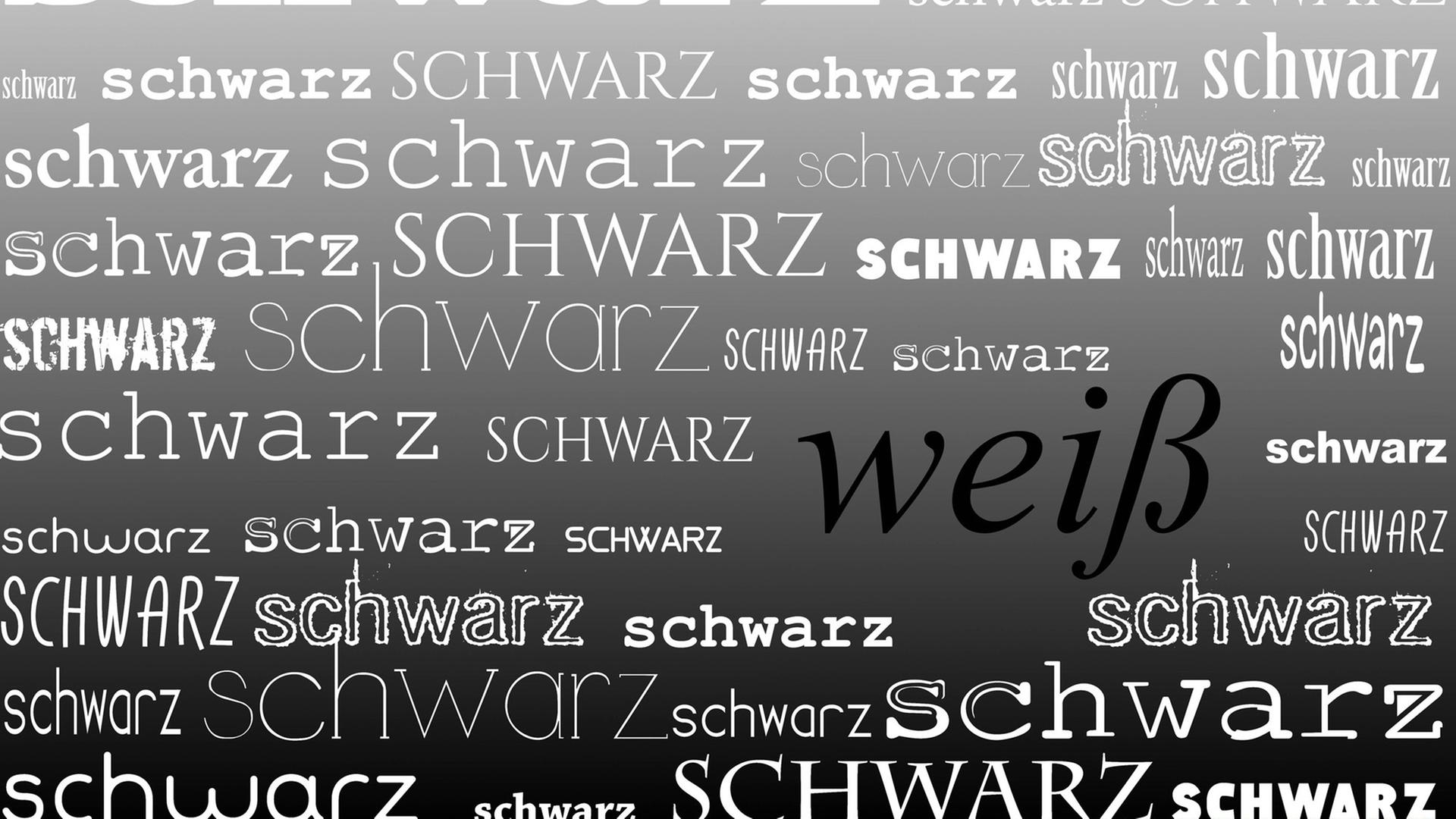 Die in Buchstaben geschriebene Worte "schwarz" und "weiß" Die in Buchstaben geschriebene Worte "schwarz" und "weiß"