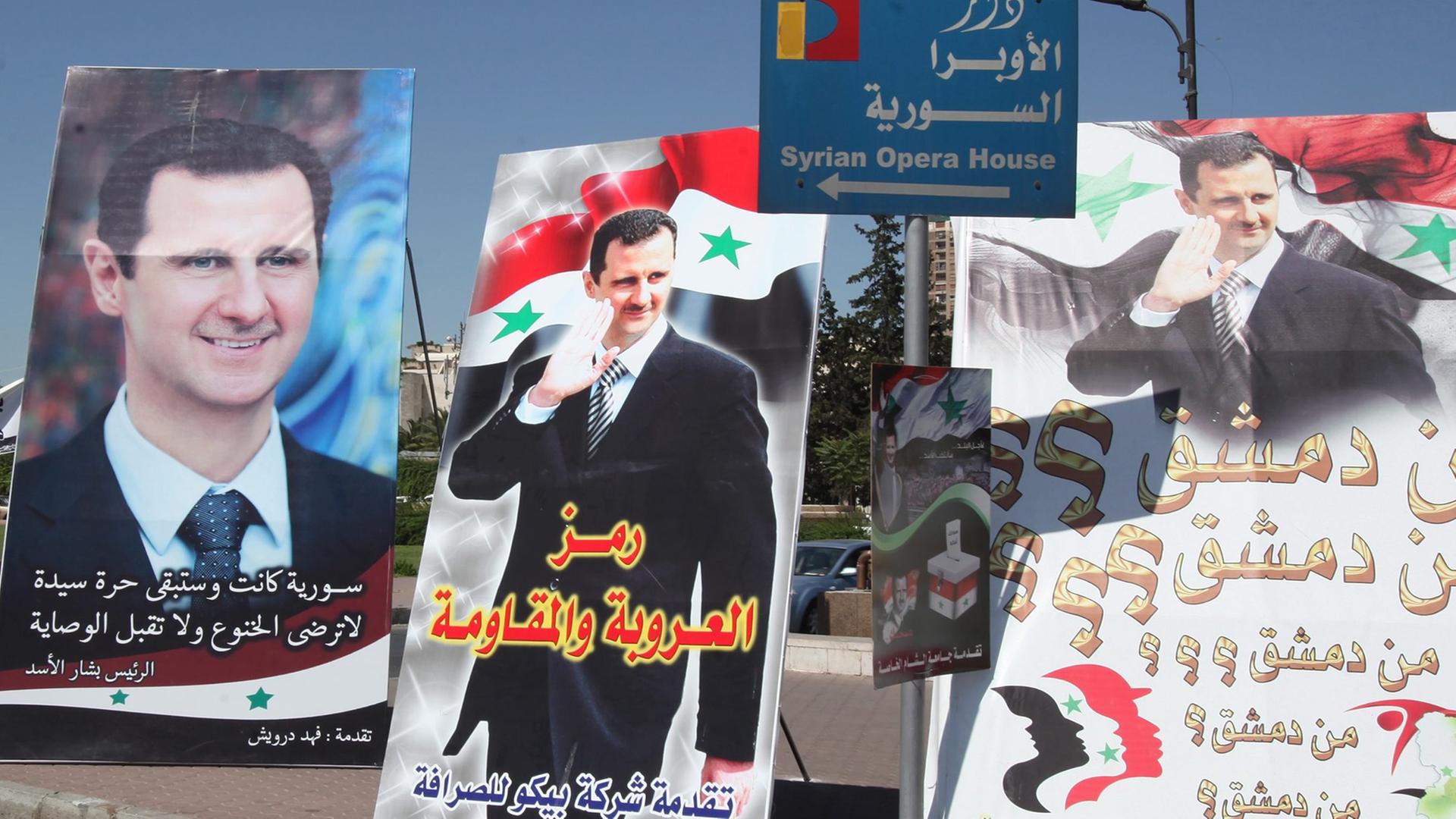 Wahlplakate von Bashar al-Assad in Damaskus. Wahlplakate von Bashar al-Assad in Damaskus.
