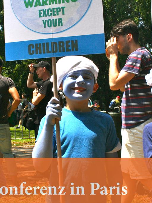 Für besseren Klimaschutz demonstrieren drei als Schlümpfe verkleidete australische Kinder am 29. November 2015 in Sydney.