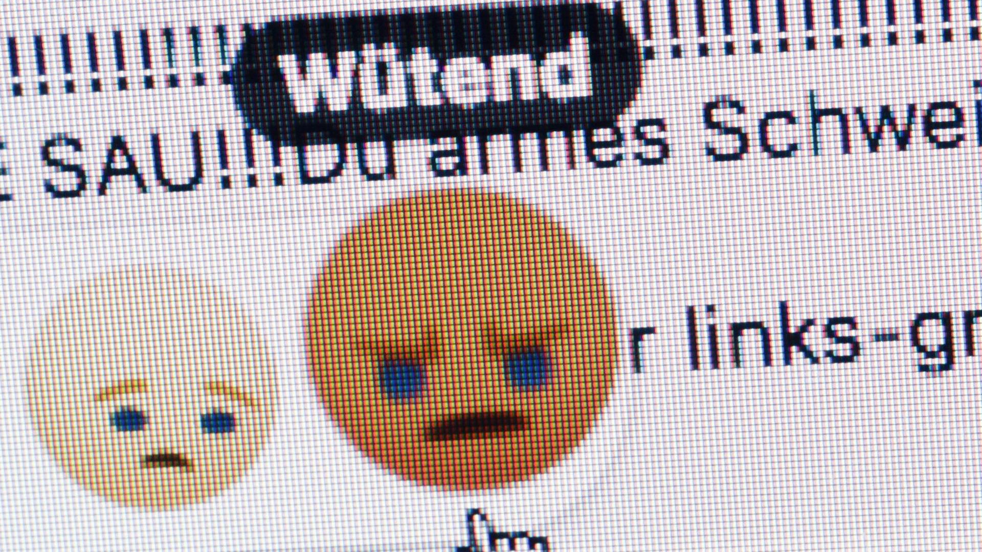 Ein wütend schauendes Emoticon bei Facebook wird mit einem Mauspfeil angeklickt. Ein wütend schauendes Emoticon bei Facebook wird mit einem Mauspfeil angeklickt.