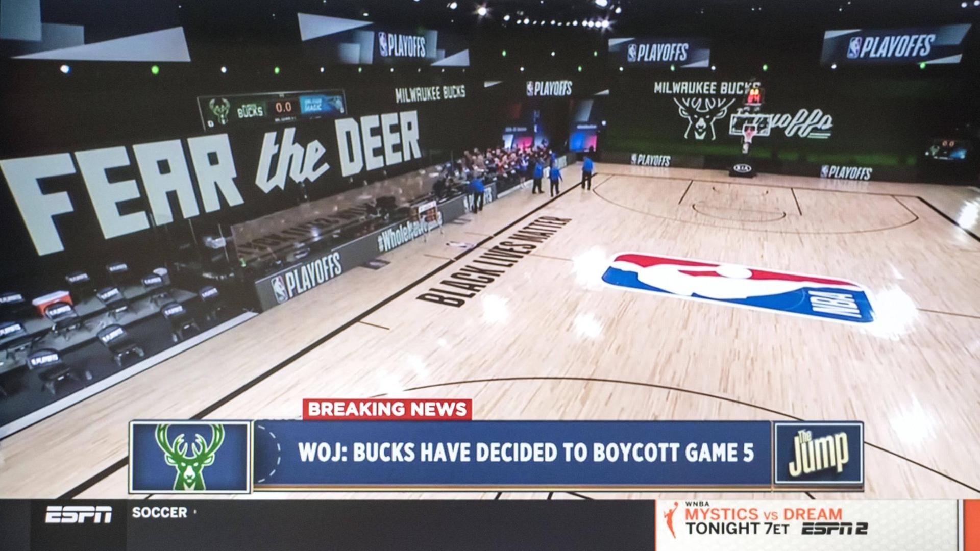 August 26, 2020, Orlando, Florida, USA - A screen grab from ESPN s coverage of the Milwaukee Bucks refusing to play today s scheduled playoff game against the Orlando Magic. After a team meeting, the Bucks decided to boycott their game in the wake of the shooting of yet another Black man, Jacob Blake, at the hands of a white policeman, this time in Kenosha, Wisconsin. After the Bucks declined to play, the Rockets also decided to boycott. Other teams have now joined the boycott, and no playoff games will be played tonight. Orlando U.S. - ZUMAce6_ 20200826_zaf_ce6_001 Copyright: xCourtesyxEspnx