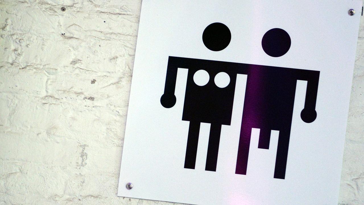 Ein Piktogramm für Männer- und Frauen-Toiletten Ein Piktogramm für Männer- und Frauen-Toiletten