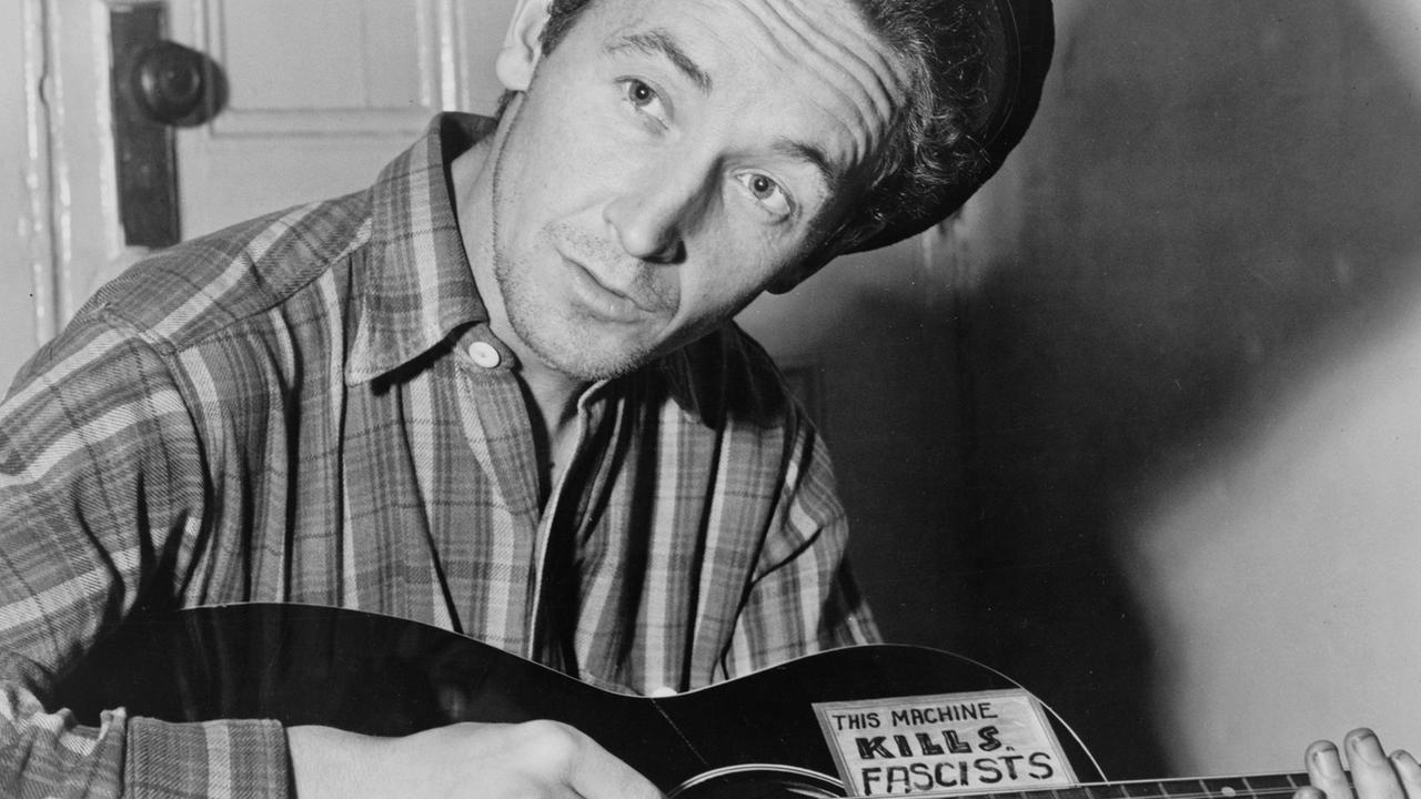 Der amerikanische Singer-Songwriter Woody Guthrie Der amerikanische Singer-Songwriter Woody Guthrie