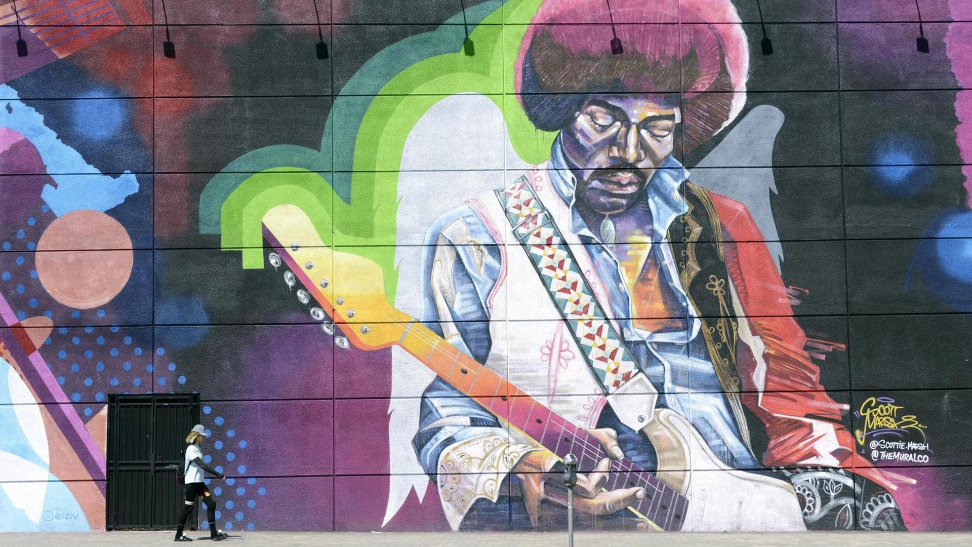 Überlebensgroßes Wandgemälde mit Jimi Hendrix. Überlebensgroßes Wandgemälde mit Jimi Hendrix.