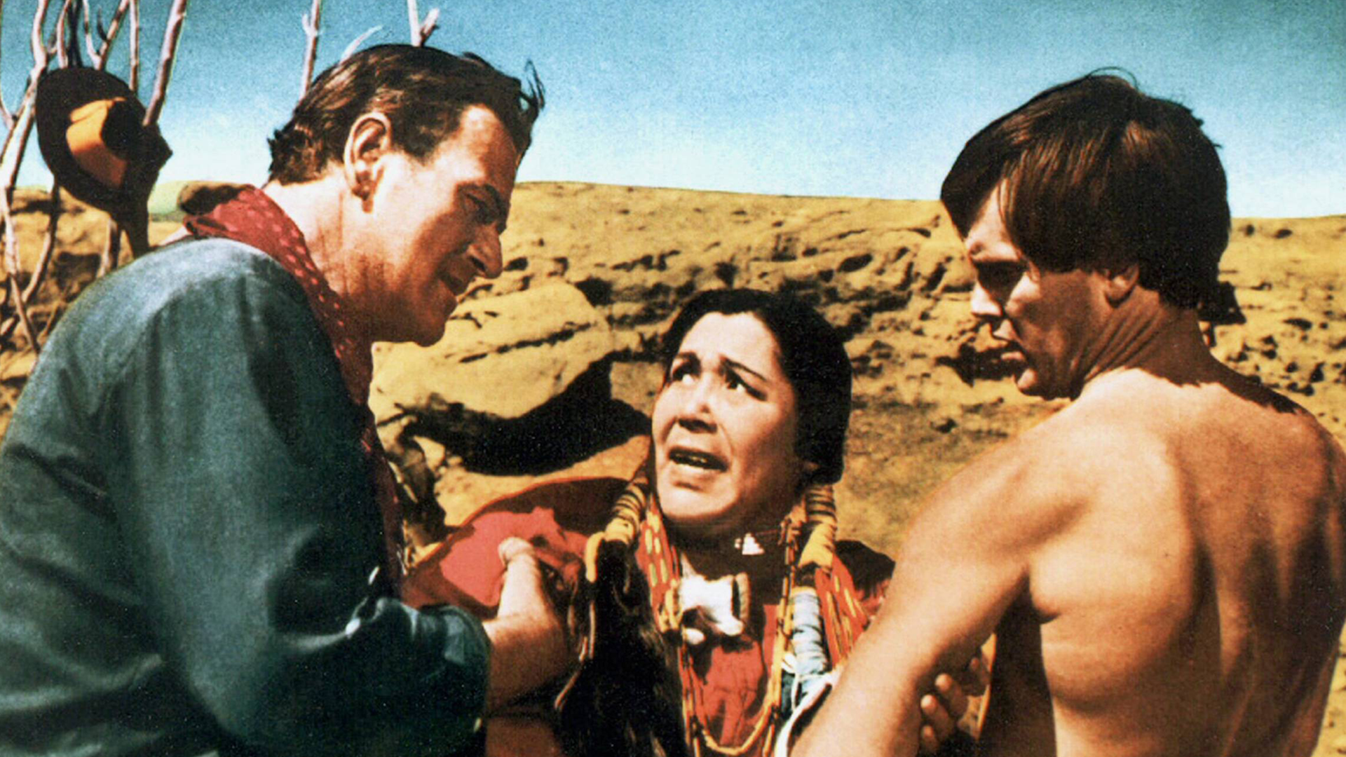 Filmszene aus "Der schwarze Falke" mit John Wayne (l), Beulah Archuletta, Jeffrey Hunter. Filmszene aus "Der schwarze Falke" mit John Wayne (l), Beulah Archuletta, Jeffrey Hunter.