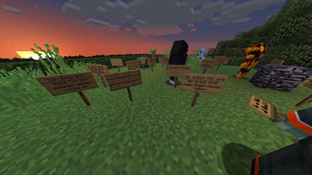 Ein Screenshot vom Minecraft-Ostergottesdienst: Auf einer Wiese stehen Schilder mit Fürbitten. "Ich bitte Gott, dass Corona schnell wieder vorbei ist", "Ich bete dafür, dass die Welt wieder normal wird", "Wir bitten für alle, die krank sind oder Angst davor haben" Ein Screenshot vom Minecraft-Ostergottesdienst: Auf einer Wiese stehen Schilder mit Fürbitten. "Ich bitte Gott, dass Corona schnell wieder vorbei ist", "Ich bete dafür, dass die Welt wieder normal wird", "Wir bitten für alle, die krank sind oder Angst davor haben"