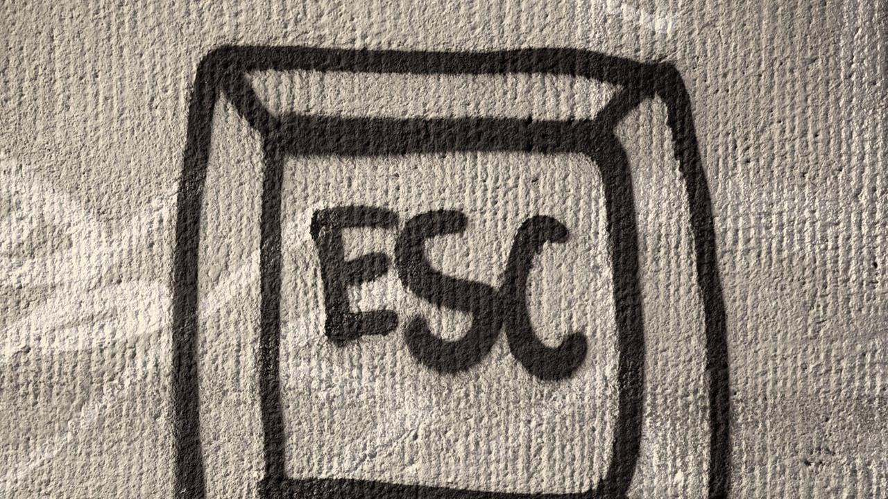Ein Sprayer hat auf die Wand einer Unterführung eine Escape-Taste gemalt. Aufgenommen in Köln-Zollstock am 08.06.2009. Ein Sprayer hat auf die Wand einer Unterführung eine Escape-Taste gemalt. Aufgenommen in Köln-Zollstock am 08.06.2009.