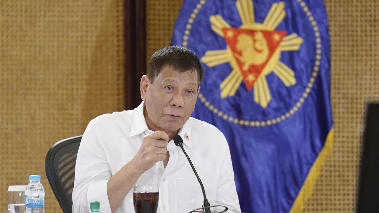 In this photo provided by the Malacanang Presidential Photographers Division, Philippine President Rodrigo Duterte meets members of the Inter-Agency Task Force on the Emerging Infectious Diseases at the Malacanang presidential palace in Manila, Philippines on Tuesday Sept. 7, 2021. The Philippines governing party has opened its national convention with delegates set to choose Duterte as its candidate for vice president in upcoming elections, a maneuver widely seen as a gambit to keep the popular leader near the center of power while avoiding constitutional term limits. (King Rodriguez/Malacanang Presidential Photographers Division via AP) In this photo provided by the Malacanang Presidential Photographers Division, Philippine President Rodrigo Duterte meets members of the Inter-Agency Task Force on the Emerging Infectious Diseases at the Malacanang presidential palace in Manila, Philippines on Tuesday Sept. 7, 2021. The Philippines governing party has opened its national convention with delegates set to choose Duterte as its candidate for vice president in upcoming elections, a maneuver widely seen as a gambit to keep the popular leader near the center of power while avoiding constitutional term limits. (King Rodriguez/Malacanang Presidential Photographers Division via AP)