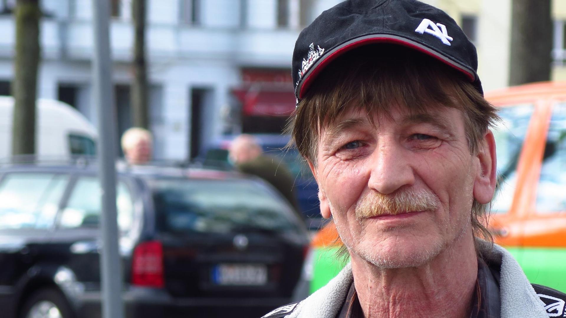 Portrait von Andreas Ley vor einem Straßenzug Portrait von Andreas Ley vor einem Straßenzug