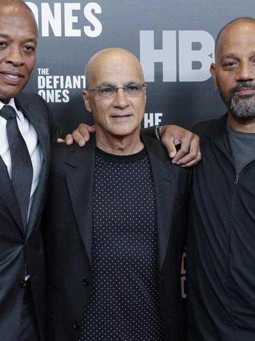 Dr. Dre, Jimmy Iovine and Allen Hughes arrives on the red carpet at The Defiant Ones premiere at Time Warner Center on June 27, 2017 in New York City.