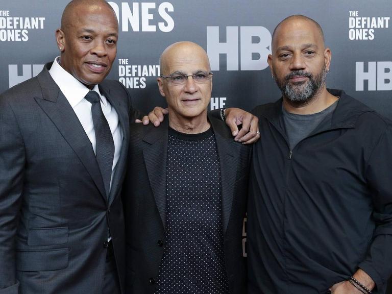 Dr. Dre, Jimmy Iovine and Allen Hughes arrives on the red carpet at The Defiant Ones premiere at Time Warner Center on June 27, 2017 in New York City.