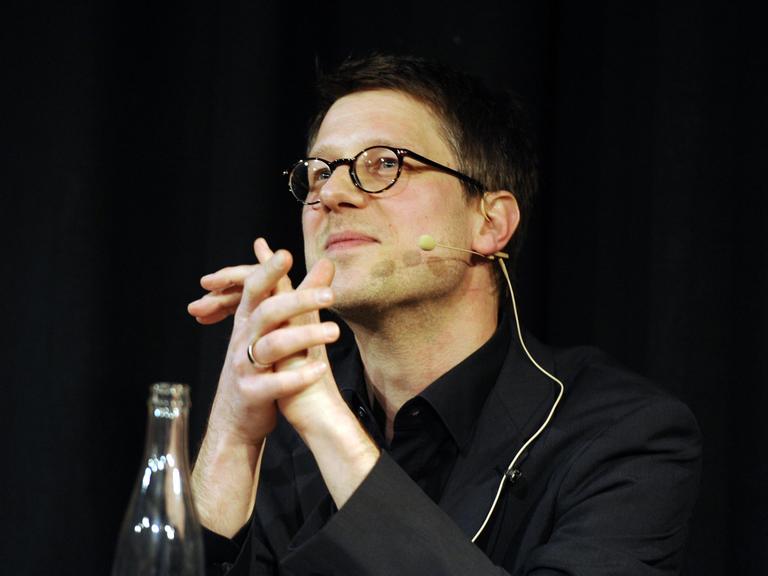 Der Autor Jan Wagner bei einer Lesung in Köln, März 2014