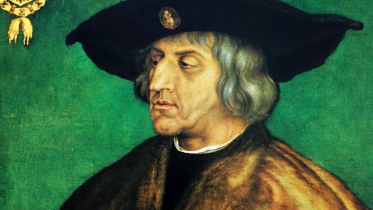 Gemälde eines Mannes, dessen schulterlanges, graues, gewelltes Haar unter einem großkrempeligen Hut fällt und mit einem wertvollen Mantel samt reichlichen Schmuckes trägt. Gemälde eines Mannes, dessen schulterlanges, graues, gewelltes Haar unter einem großkrempeligen Hut fällt und mit einem wertvollen Mantel samt reichlichen Schmuckes trägt.