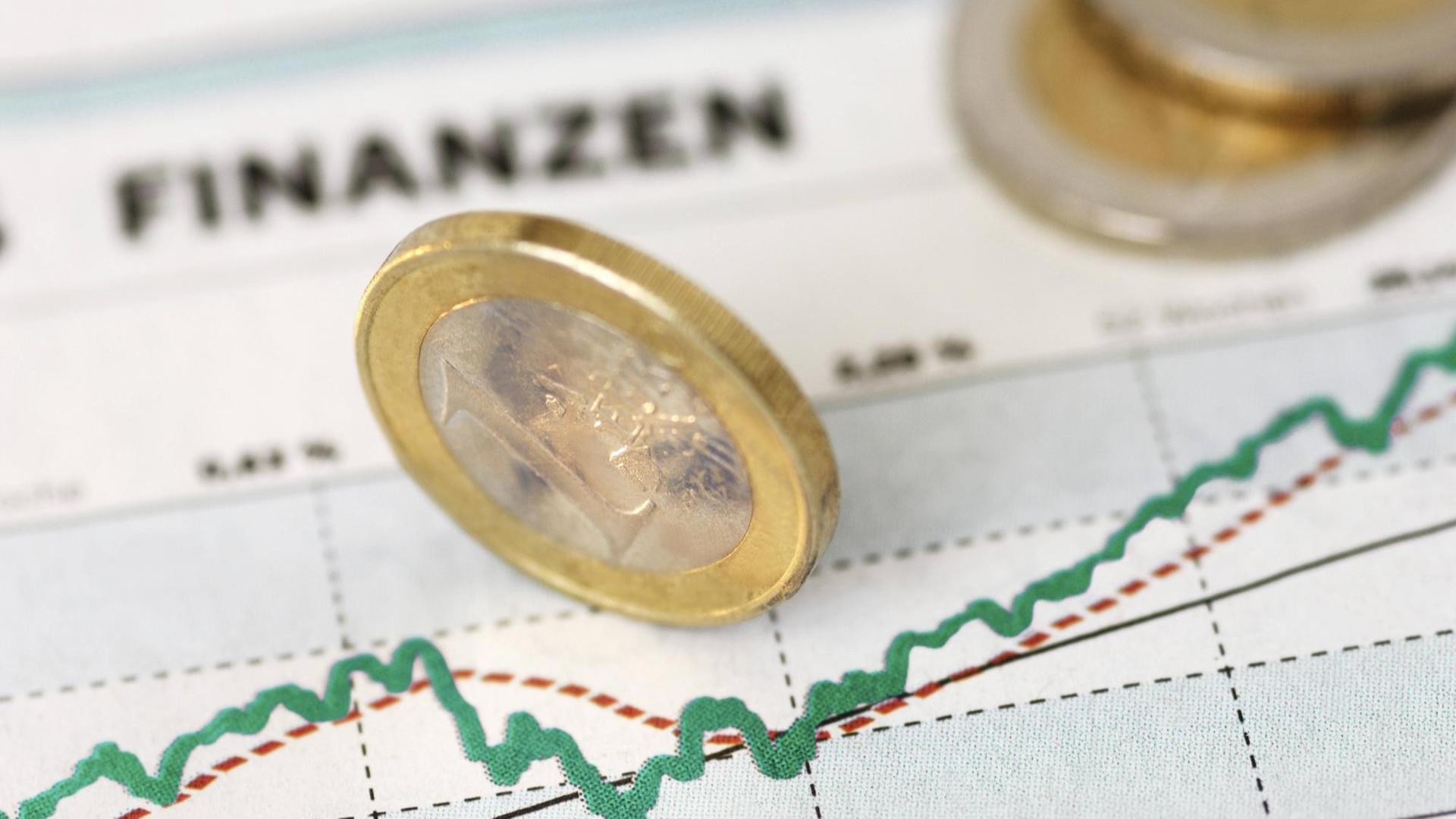 Kurs-Chart mit Euro-Münzen Kurs-Chart mit Euro-Münzen