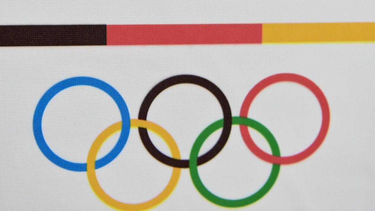 Das Logo des Deutschen Olympischen Sportbundes (DOSB), am 11.09.2014 in Berlin. Das Logo des Deutschen Olympischen Sportbundes (DOSB), am 11.09.2014 in Berlin.