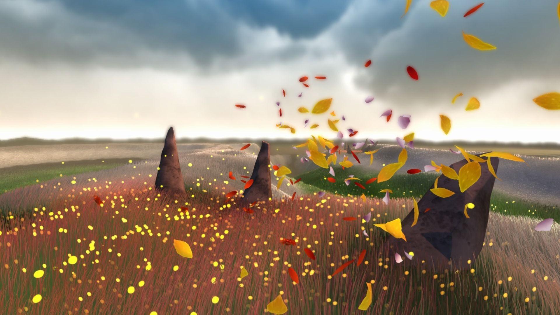 In einer herbstlichen Landschaft wehen Blätter und Blüten vor einem wolkenverhanden Himmel In einer herbstlichen Landschaft wehen Blätter und Blüten vor einem wolkenverhanden Himmel