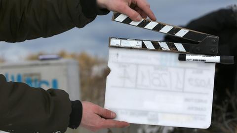 Eine Filmklappe, wie sie bei Dreharbeiten verwendet wird.