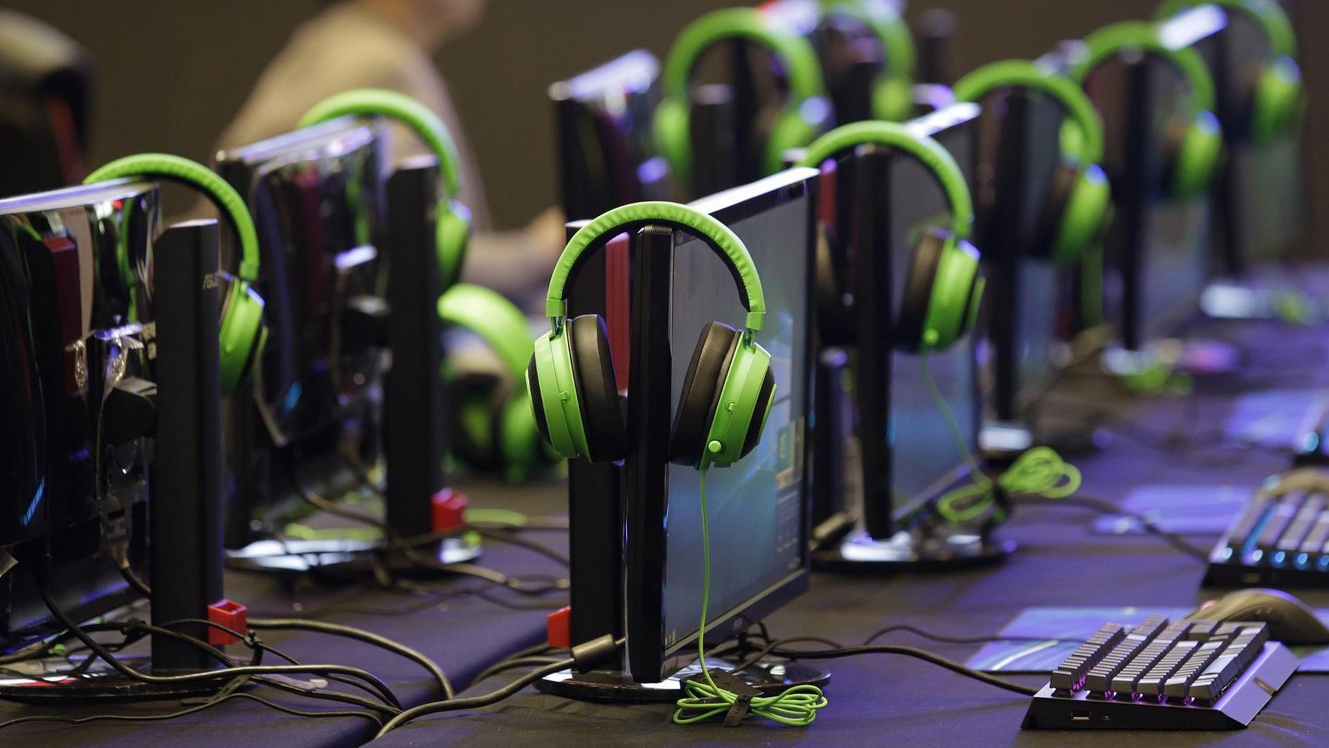 In this Thursday, Aug. 29, 2019 photo, headphones are placed on top of computer screens as it awaits esport (electronic sport) players who will participate in the qualifying rounds for the first Philippine esport team in metropolitan Manila, Philippines. Esports, a form of competition using video games, will be making its debut as a medal sport at the 30th South East Asian Games in the country which starts November this year. (AP Photo/Aaron Favila) | In this Thursday, Aug. 29, 2019 photo, headphones are placed on top of computer screens as it awaits esport (electronic sport) players who will participate in the qualifying rounds for the first Philippine esport team in metropolitan Manila, Philippines. Esports, a form of competition using video games, will be making its debut as a medal sport at the 30th South East Asian Games in the country which starts November this year. (AP Photo/Aaron Favila) |