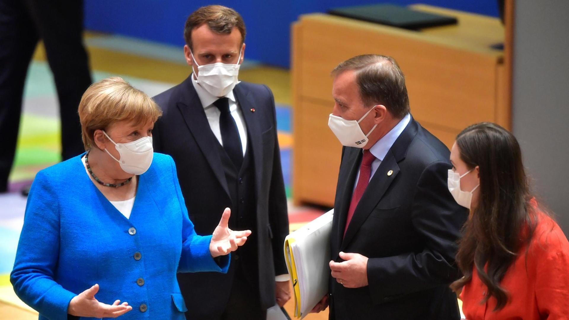 Brüssel im Juli 2020: Die vier europäischen Regierungs- und Staatschefs Merkel, Macron, Marin und Löfven, im Gespräch über Coronahilfen und die mittelfristige Finanzplanung der EU. Brüssel im Juli 2020: Die vier europäischen Regierungs- und Staatschefs Merkel, Macron, Marin und Löfven, im Gespräch über Coronahilfen und die mittelfristige Finanzplanung der EU.