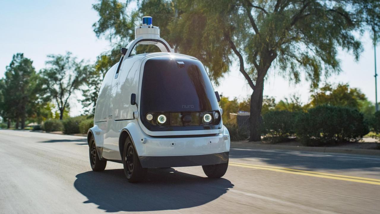 Ein vollautomatischer Roboterwagen der japanischen Firma Nuro.ai. Ein vollautomatischer Roboterwagen der japanischen Firma Nuro.ai.