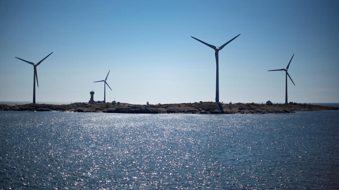 Windfarms set on deserted islands are photographed on July 29, 2017 near the Aland Islands, an autonomous archipelago belonging to Finland, half way between Finland and Sweden in the Baltic sea. OLIVIER MORIN / AFP Windfarms set on deserted islands are photographed on July 29, 2017 near the Aland Islands, an autonomous archipelago belonging to Finland, half way between Finland and Sweden in the Baltic sea. OLIVIER MORIN / AFP