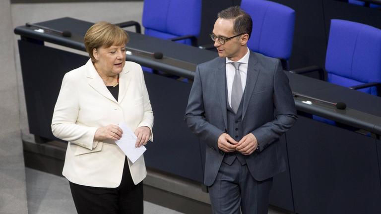 Bundeskanzlerin Angela Merkel und Außenminister Heiko Maas.