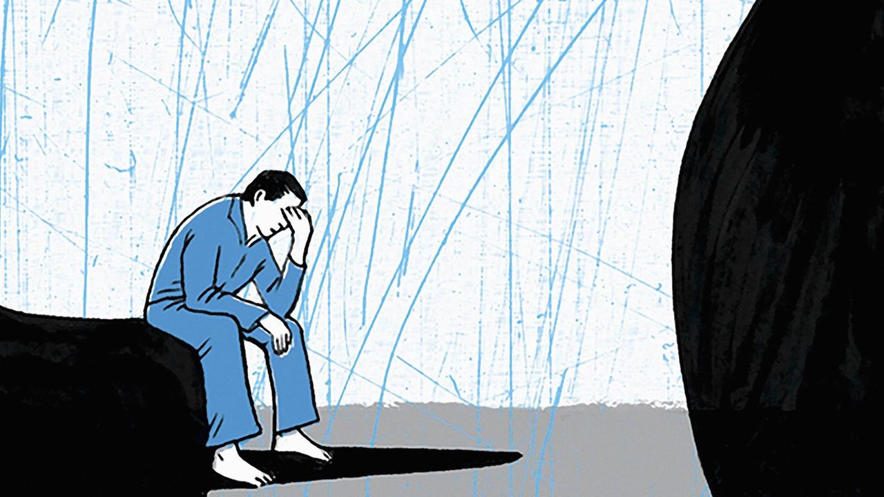 Illustration: Ein deprimierter Mann hält seinen Kopf in den Händen. Illustration: Ein deprimierter Mann hält seinen Kopf in den Händen.