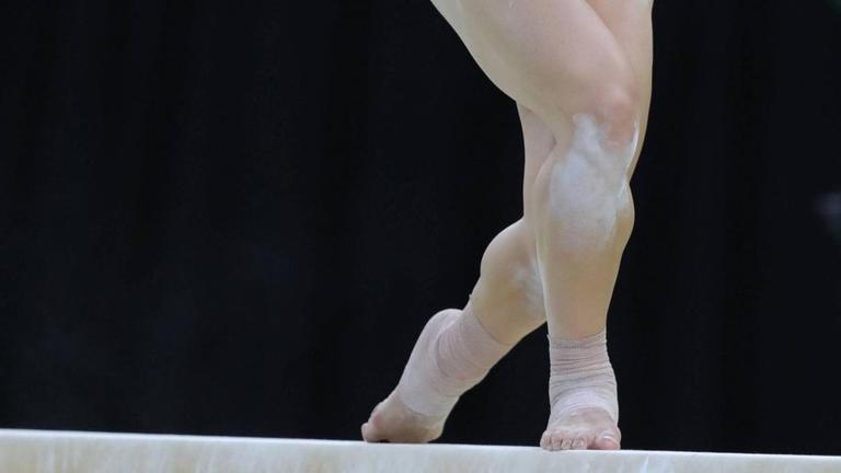 US-Turnerin Alexandra Raisman bei den Olympischen Spielen 2016 in Rio auf dem Schwebebalken US-Turnerin Alexandra Raisman bei den Olympischen Spielen 2016 in Rio auf dem Schwebebalken