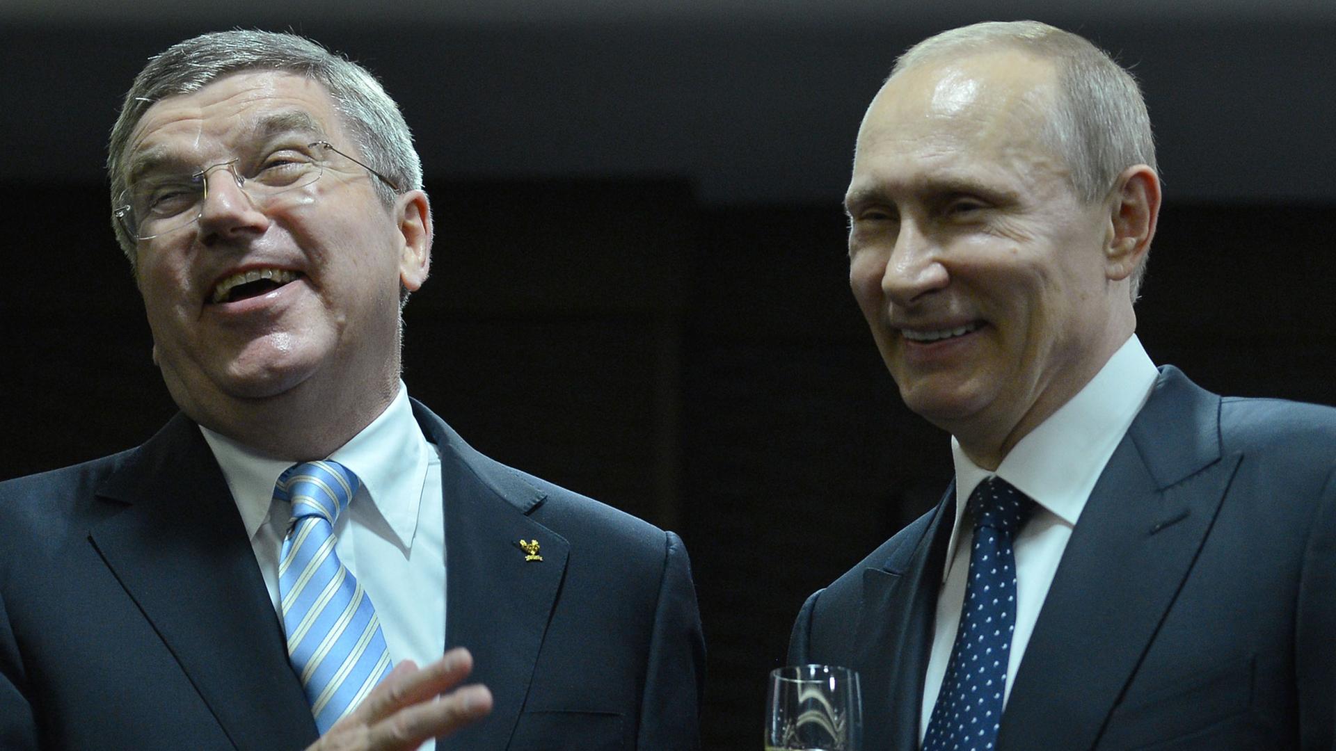 IOC-Präsident Thomas Bach und Russlands Präsident Wladimir Putin in Sotschi 2014. IOC-Präsident Thomas Bach und Russlands Präsident Wladimir Putin in Sotschi 2014.