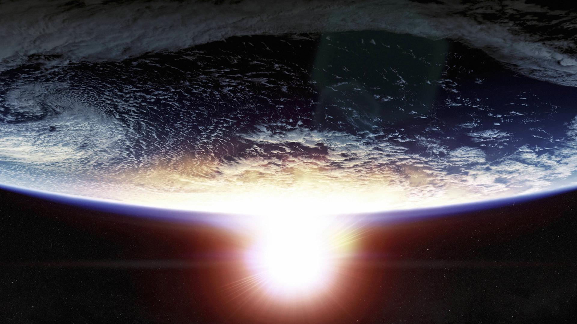 Vom Weltraum aus betrachtet: ein Sonnenuntergang über der Erde Vom Weltraum aus betrachtet: ein Sonnenuntergang über der Erde