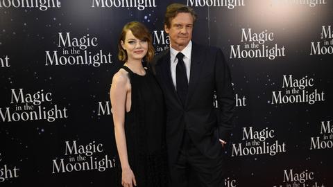 US actress Emma Stone (L) and British actor Colin Firth pose during a photocall for the premiere of US director Woody Allen's movie "Magic in the moonlight", on September 11, 2014, in Paris.