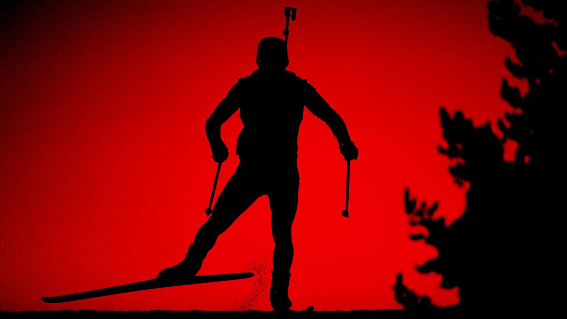 Silhouette eines Biathlonsportlers. Silhouette eines Biathlonsportlers.