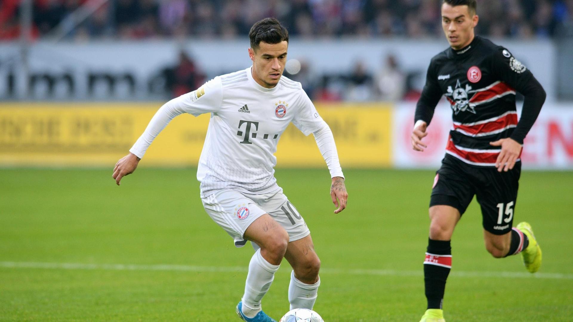 Philippe Coutinho (links/FC Bayern) und Düsseldorfs Erik Thommy Philippe Coutinho (links/FC Bayern) und Düsseldorfs Erik Thommy