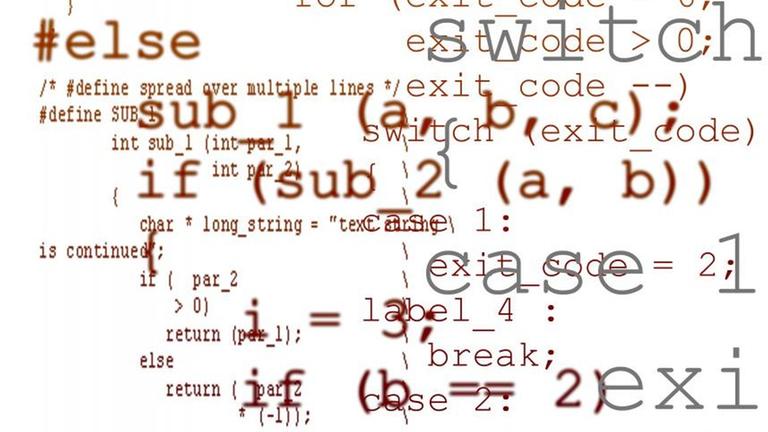 Ausschnitte eines größeren Computerprogramms liegen übereinander. Ausschnitte eines größeren Computerprogramms liegen übereinander.