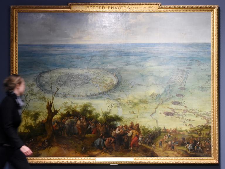 Das Werk "Entsatz von Löwen" aus dem Jahr 1639 von Pieter Snayers. Darauf zu sehen eine Vogelperspektive auf eine weite Landschaft, im Vordergrund Menschentrauben.