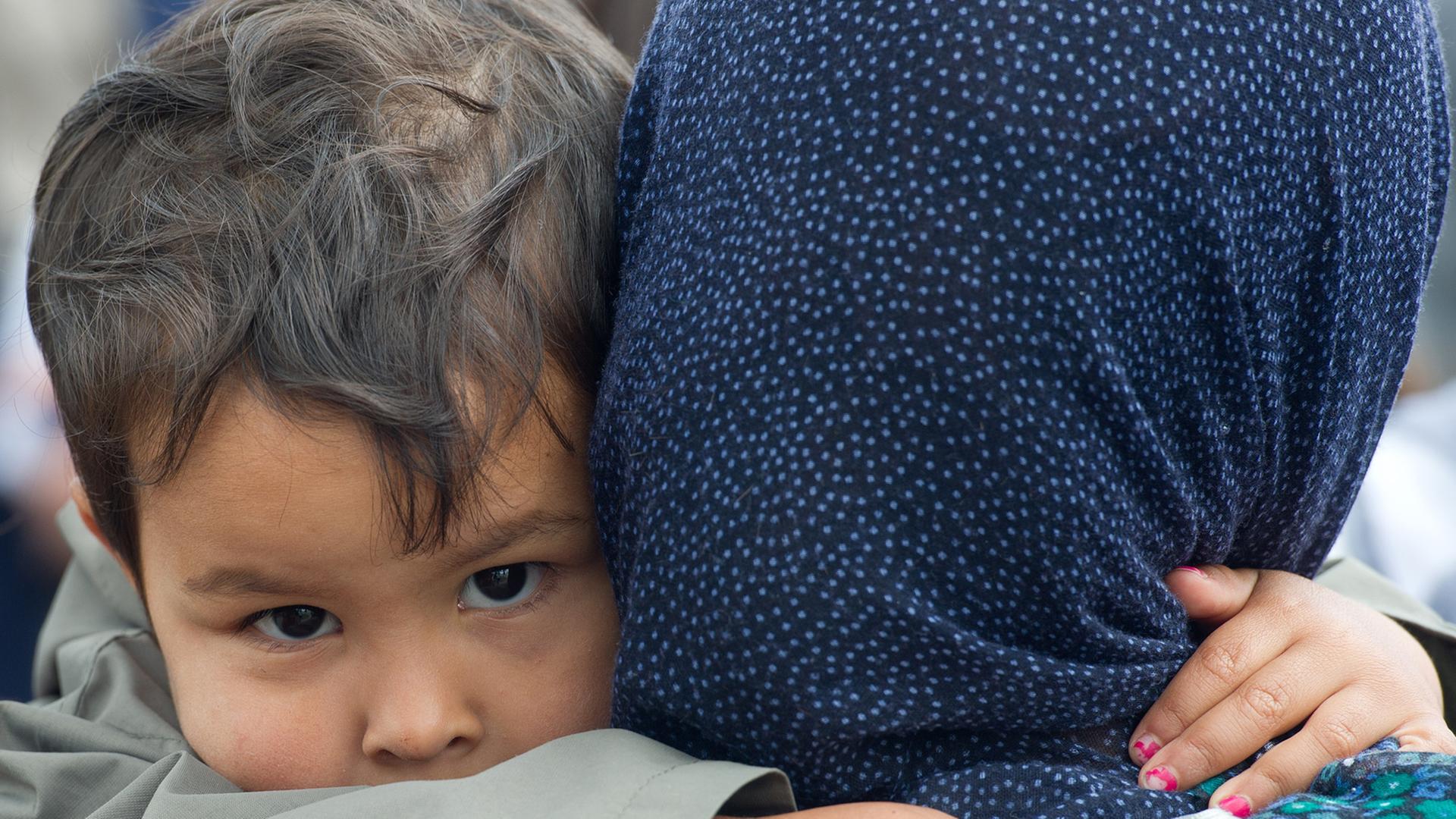 Ein Flüchtlingskind in Eisenhüttenstadt (2011) Ein Flüchtlingskind in Eisenhüttenstadt (2011)