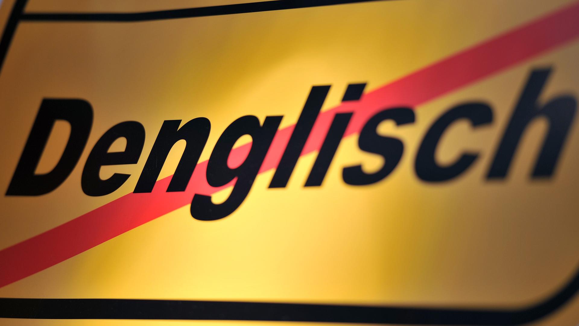 "Denglisch" steht auf der Leipziger Buchmesse auf einem Plakat. "Denglisch" steht auf der Leipziger Buchmesse auf einem Plakat.