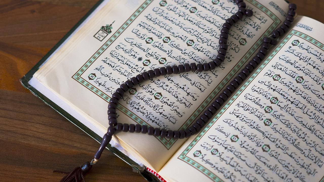 Koran und Gebetskette Koran und Gebetskette