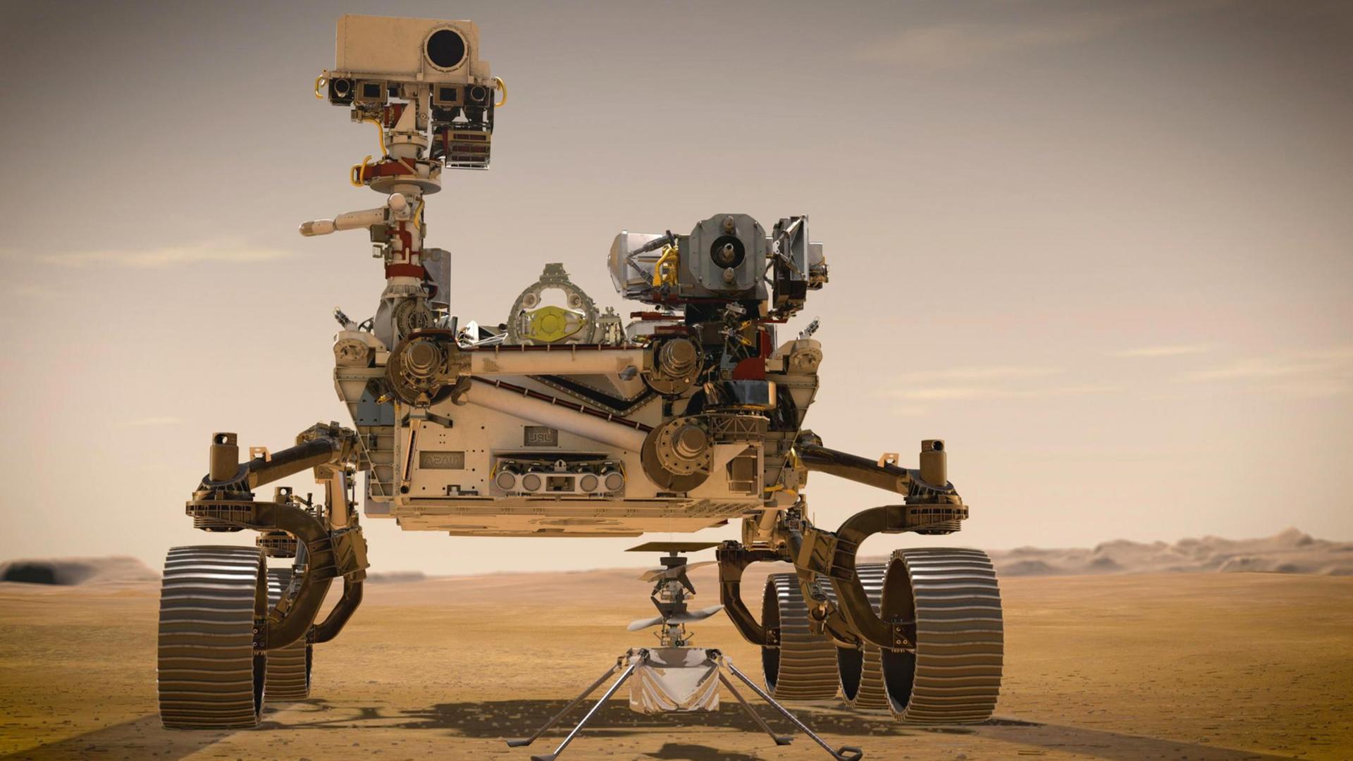 Modell des Marsrovers "Perseverance". Im Vordergrund der Mars Helikopter, der auf dem Roten Planeten zum Einsatz kommen soll. Modell des Marsrovers "Perseverance". Im Vordergrund der Mars Helikopter, der auf dem Roten Planeten zum Einsatz kommen soll.