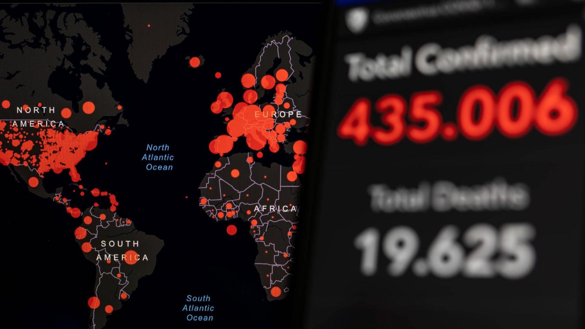 Eine digitale Karte zeigt Zahlen und Ausmaß der Corona-Epidemie. Eine digitale Karte zeigt Zahlen und Ausmaß der Corona-Epidemie.