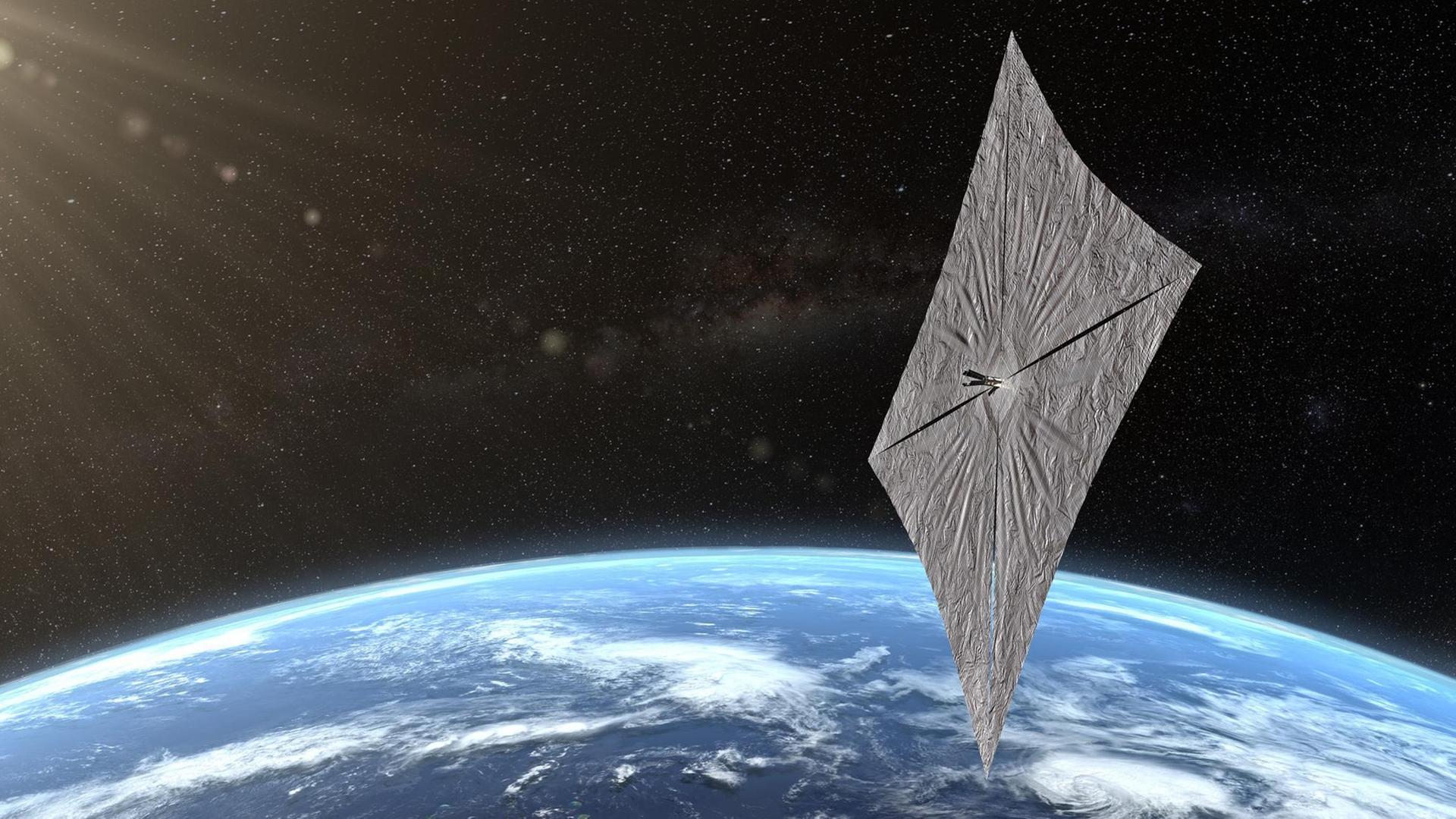 Ein Ausschnitt der Erde vom All aus gesehen. Darüber die Illustration des Sonnensegels des Satelliten "LightSail2". Ein Ausschnitt der Erde vom All aus gesehen. Darüber die Illustration des Sonnensegels des Satelliten "LightSail2".