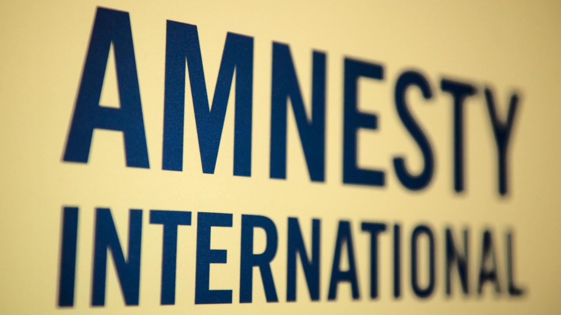 Das Logo der Menschenrechtsorganisation Amnesty International in Deutschland Das Logo der Menschenrechtsorganisation Amnesty International in Deutschland
