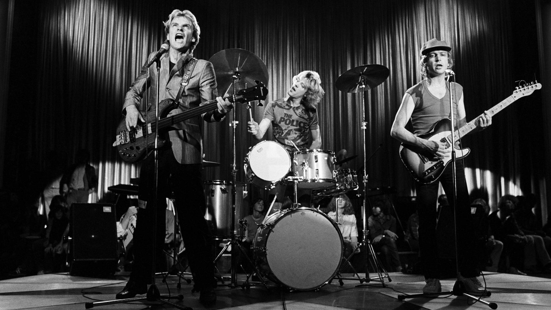 Die Band "The Police" mit Sänger Sting (l.) bei einem Auftritt Anfang der 80er-Jahre. Die Band "The Police" mit Sänger Sting (l.) bei einem Auftritt Anfang der 80er-Jahre.