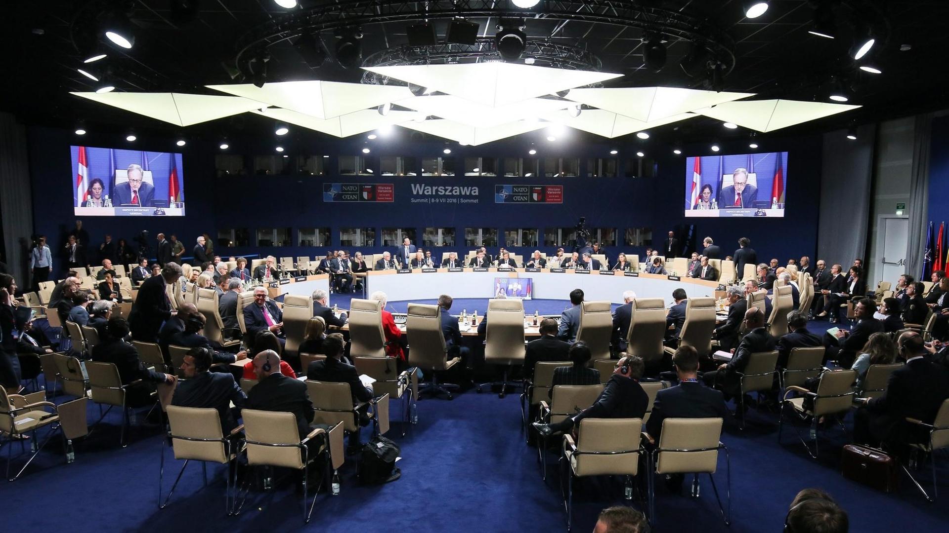 epa05415712 A general view on the NATO and Georgia Foreign Ministers Commission at the NATO Summit at the National Stadium in Warsaw, Poland, 08 July 2016. The NATO Warsaw Summit which is expected to decide about military reinforcements on NATO territory in Central-East Europe takes place on 08 and 09 July. About 2,000 delegates, including 18 state heads, 21 prime ministers, 41 foreign ministers and 39 defence ministers will take part in the Summit. EPA/PAWEL SUPERNAK POLAND OUT +++(c) dpa - Bildfunk+++ epa05415712 A general view on the NATO and Georgia Foreign Ministers Commission at the NATO Summit at the National Stadium in Warsaw, Poland, 08 July 2016. The NATO Warsaw Summit which is expected to decide about military reinforcements on NATO territory in Central-East Europe takes place on 08 and 09 July. About 2,000 delegates, including 18 state heads, 21 prime ministers, 41 foreign ministers and 39 defence ministers will take part in the Summit. EPA/PAWEL SUPERNAK POLAND OUT +++(c) dpa - Bildfunk+++