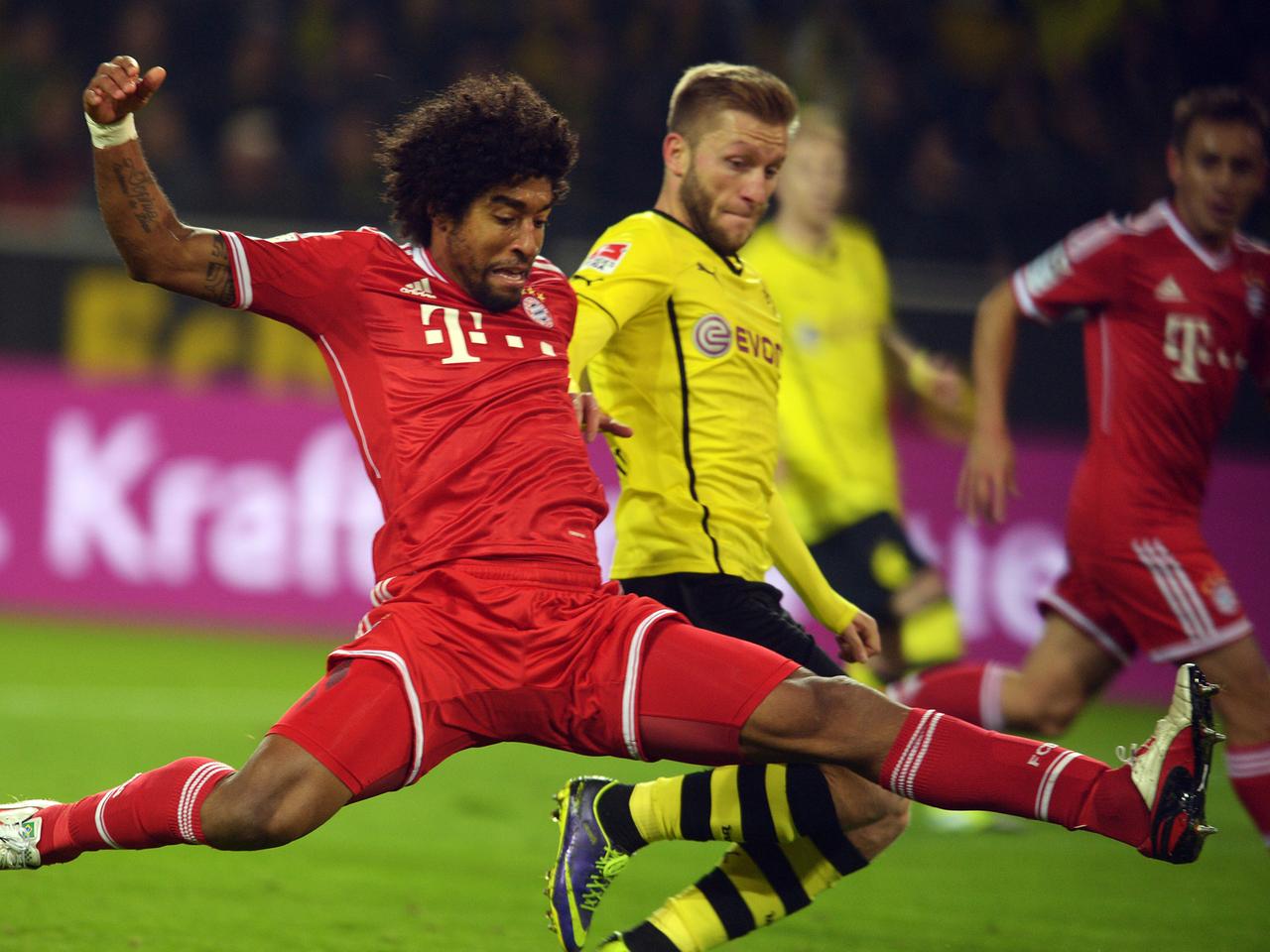 Zweikampf zwischen Dante (Bayern München, links) und Jakub Blaszczykowski (Borussia Dortmund) Zweikampf zwischen Dante (Bayern München, links) und Jakub Blaszczykowski (Borussia Dortmund)