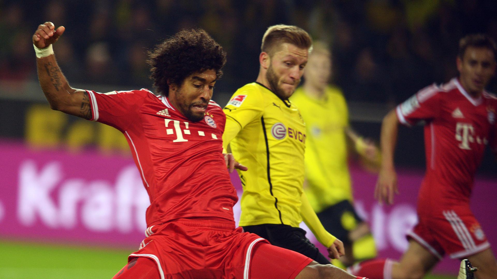Zweikampf zwischen Dante (Bayern München, links) und Jakub Blaszczykowski (Borussia Dortmund) Zweikampf zwischen Dante (Bayern München, links) und Jakub Blaszczykowski (Borussia Dortmund)
