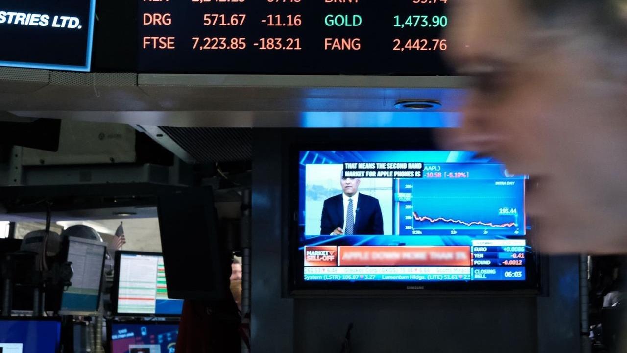 Händler auf dem Parkett der New Yorker Börse Händler auf dem Parkett der New Yorker Börse