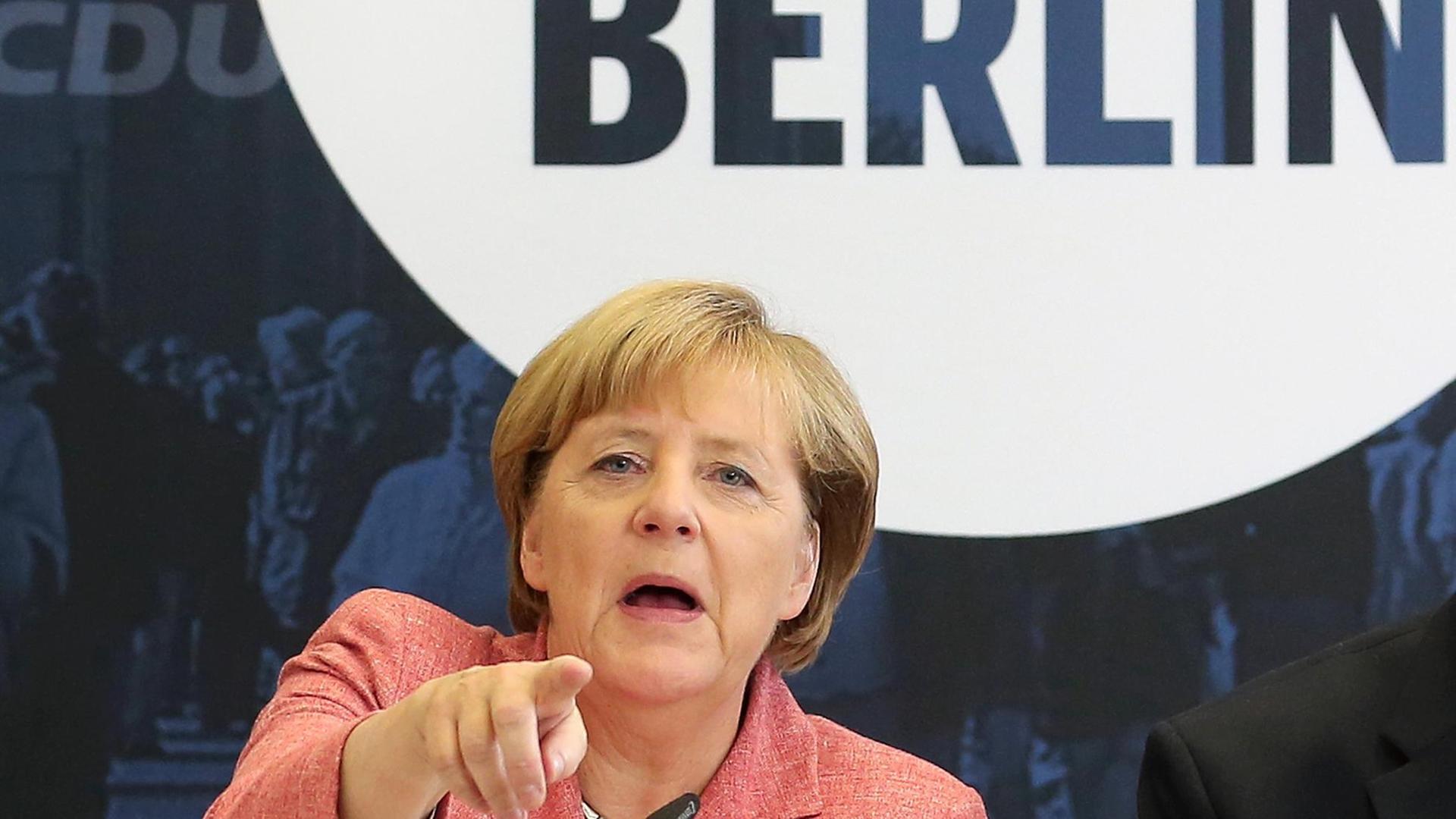 Bundeskanzlerin Angela Merkel (CDU) am 06.09.2016 im Konrad-Adenauer-Haus in Berlin beim Wirtschaftstag der Berliner CDU mit Wirtschaftsvertretern. Bundeskanzlerin Angela Merkel (CDU) am 06.09.2016 im Konrad-Adenauer-Haus in Berlin beim Wirtschaftstag der Berliner CDU mit Wirtschaftsvertretern.