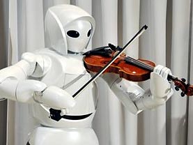 Der japanische Konzern Toyota hat diesen Geige spielenden Roboter gebaut. Der japanische Konzern Toyota hat diesen Geige spielenden Roboter gebaut.