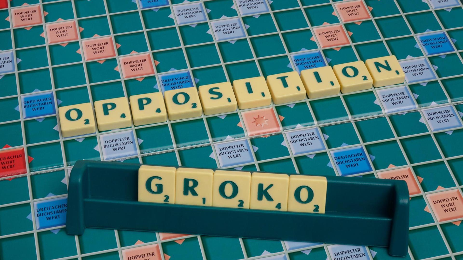 Auf einem Scrabblespiel sind die Worte Groko und Opposition. Auf einem Scrabblespiel sind die Worte Groko und Opposition.